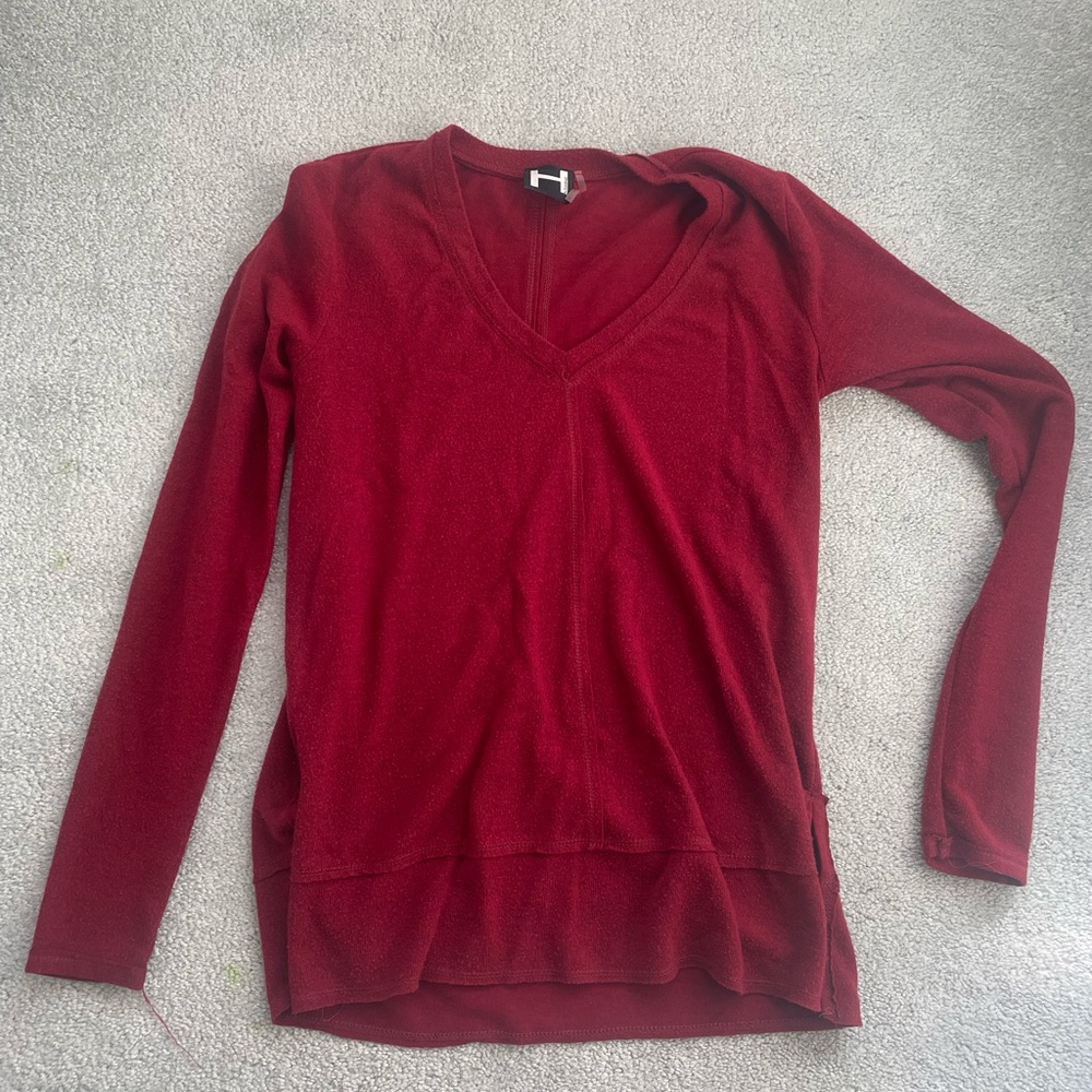 Red sweater/top slightly fuzzy on the outside. Size XS